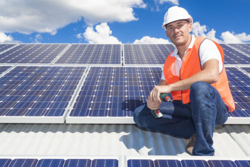 technician on solar roof