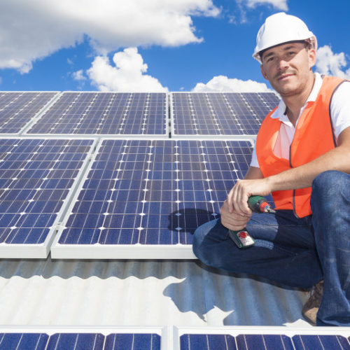 technician on solar roof